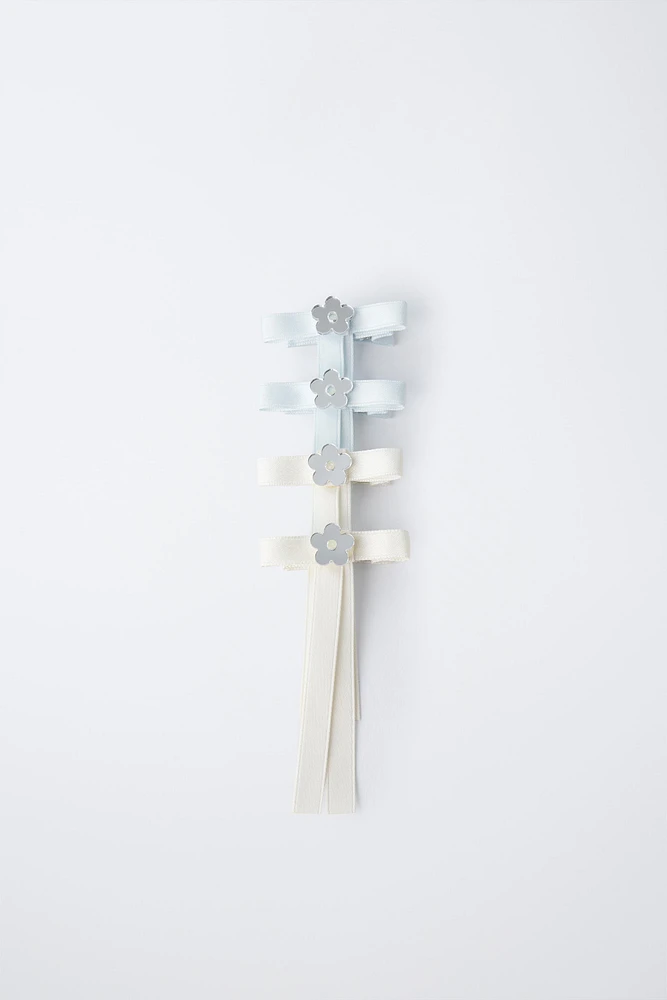 LOT DE QUATRE PINCES CLIP LACET FLEUR