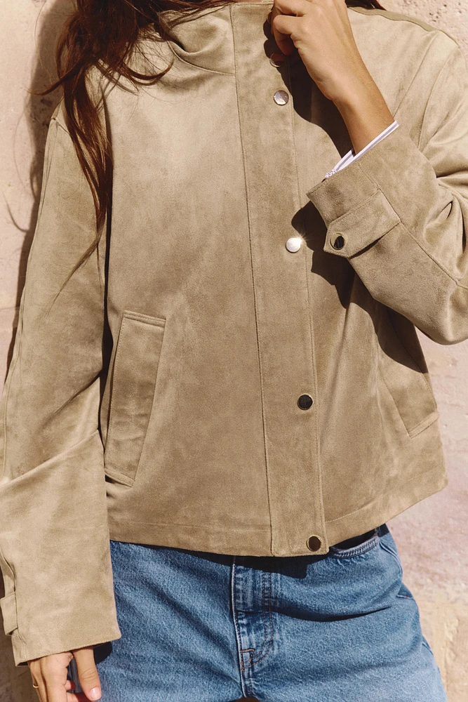 BLOUSON EN MATIÈRE SYNTHÉTIQUE