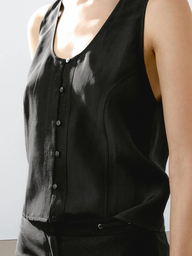 Top boutonné surpiqûre et plastron
