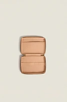 TROUSSE EN CUIR