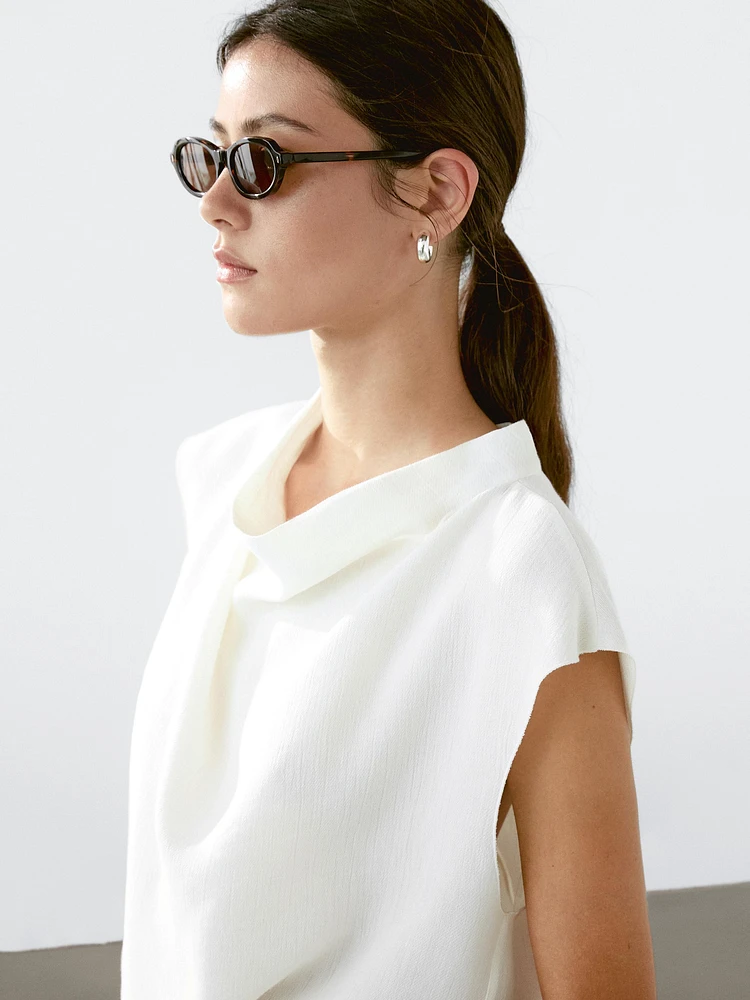 Flowing blouse with draped collar