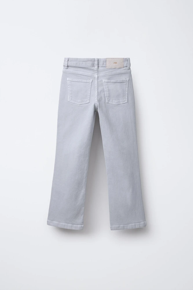 STUDDED FLARE JEANS