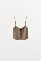 CORSET EN MAILLE À LACETS
