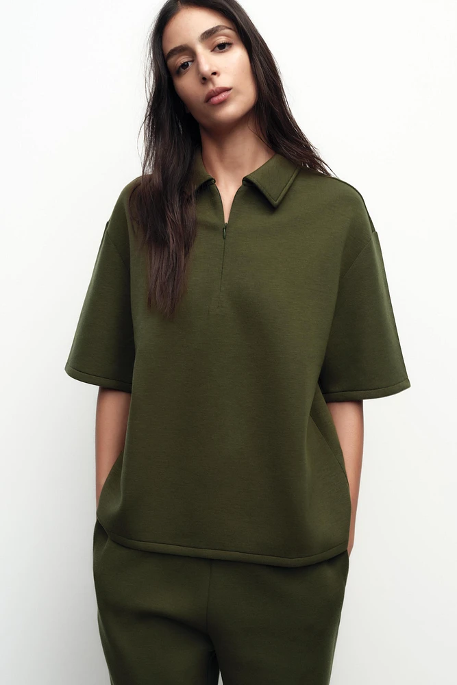 TOP À COL POLO AVEC ZIP