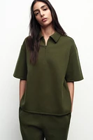 TOP À COL POLO AVEC ZIP