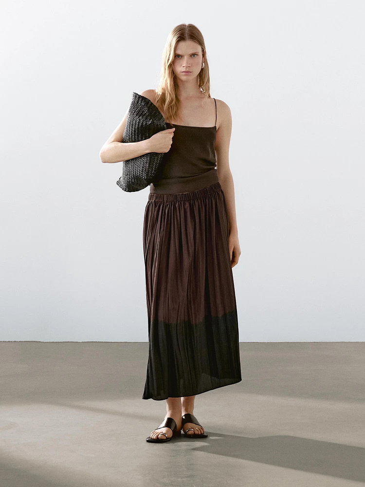 Long flowing pleated skirt