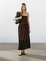 Long flowing pleated skirt