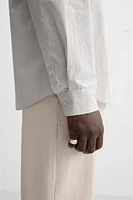 CHEMISE À CARREAUX AVEC POCHE