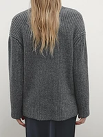 Pull en maille perlée à col effiloché