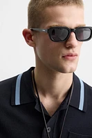 POLO EN MAILLE À POCHE