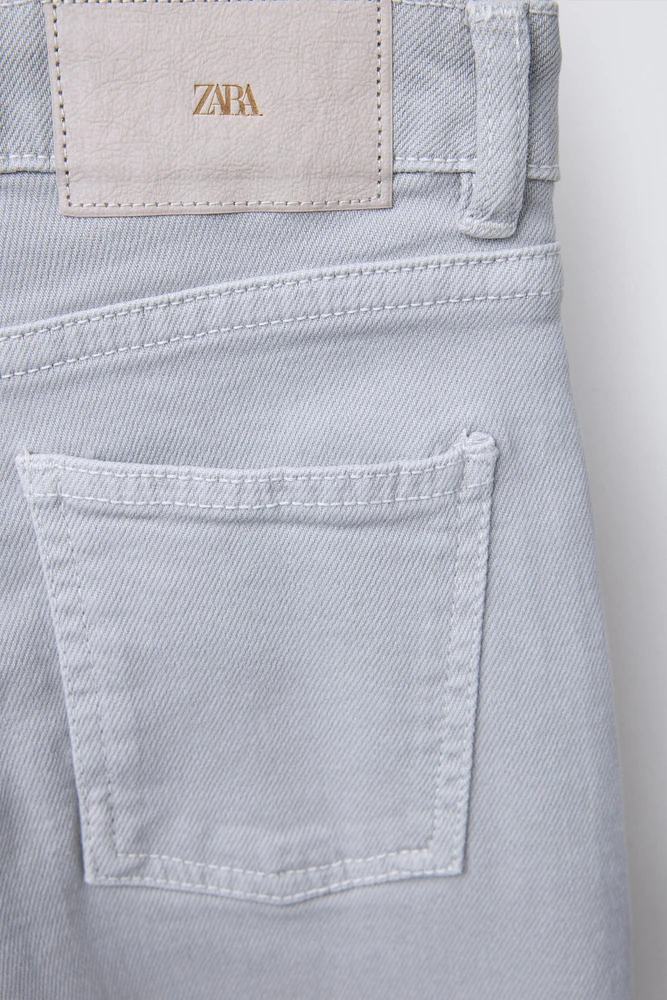 STUDDED FLARE JEANS
