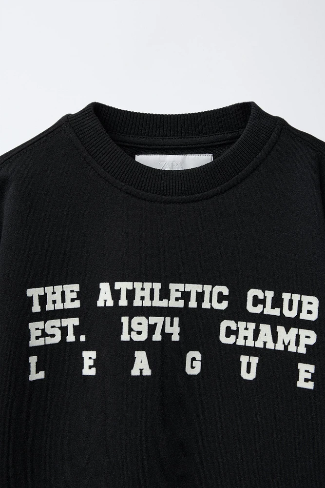FLOCKED VARSITY T-SHIRT
