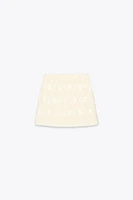 MINI-JUPE BRODERIES EFFRANGÉES