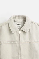 VESTE EN JEAN AVEC COL MATIÈRES VARIÉES