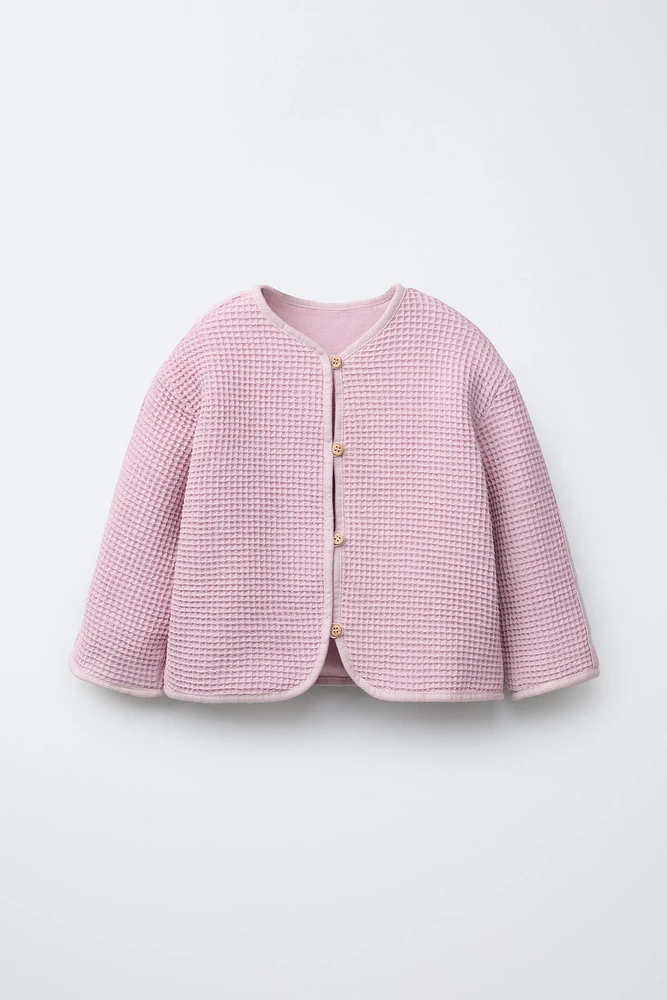 VESTE GAUFRÉE À BOUTONS