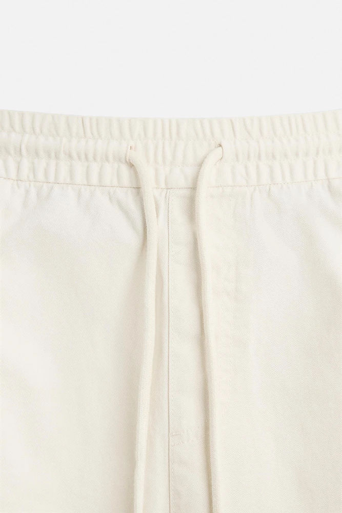 BERMUDA RELAXED FIT DÉLAVÉ