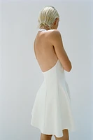 SHORT HALTER GODET DRESS