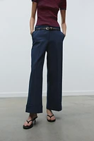 PANTALON AVEC CEINTURE ET REVERS