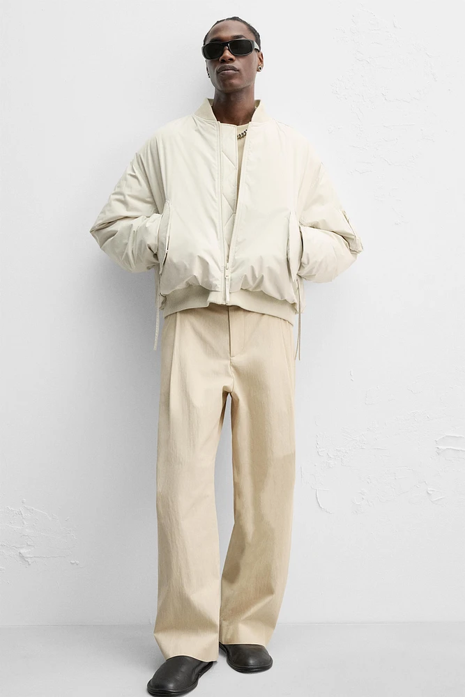 PANTALON RELAXED FIT À PLIS ÉDITION LIMITÉE