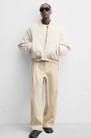 PANTALON RELAXED FIT À PLIS ÉDITION LIMITÉE