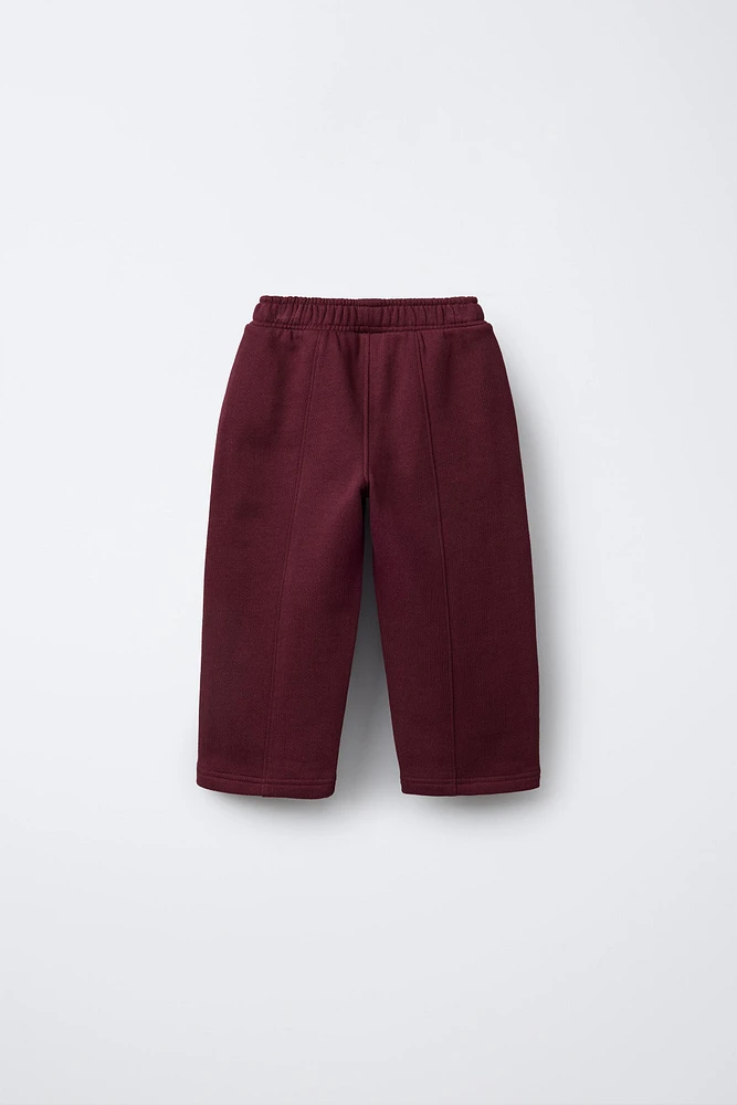 STRAIGHT PLUSH TEXT PANTS