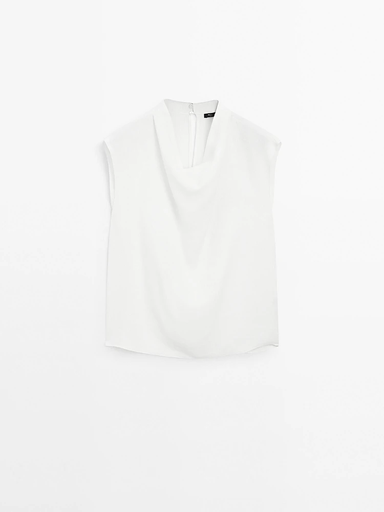 Flowing blouse with draped collar