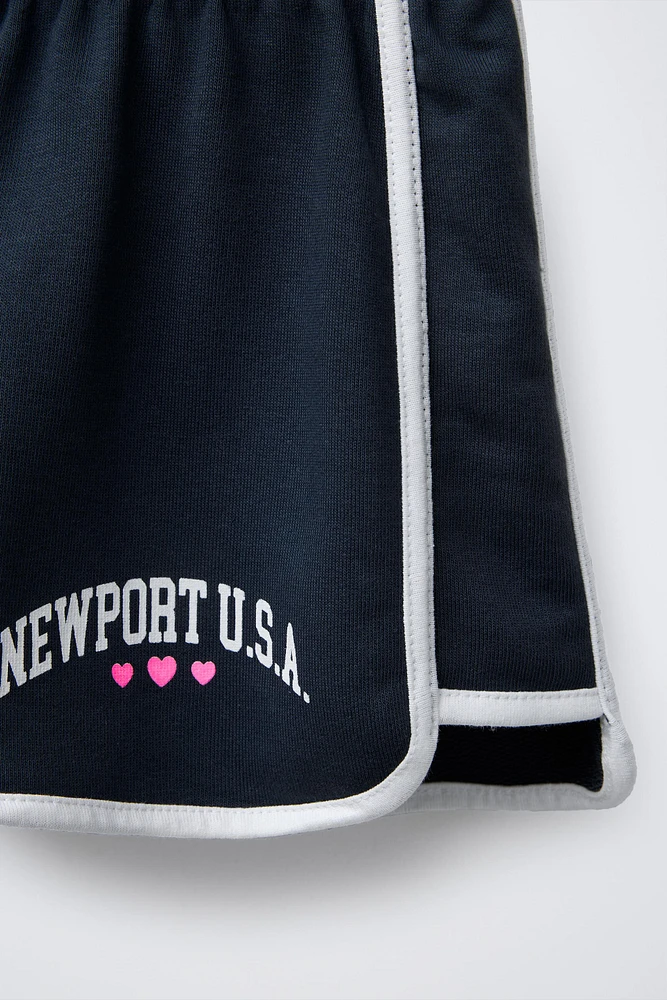 VARSITY PRINTED PLUSH SHORTS