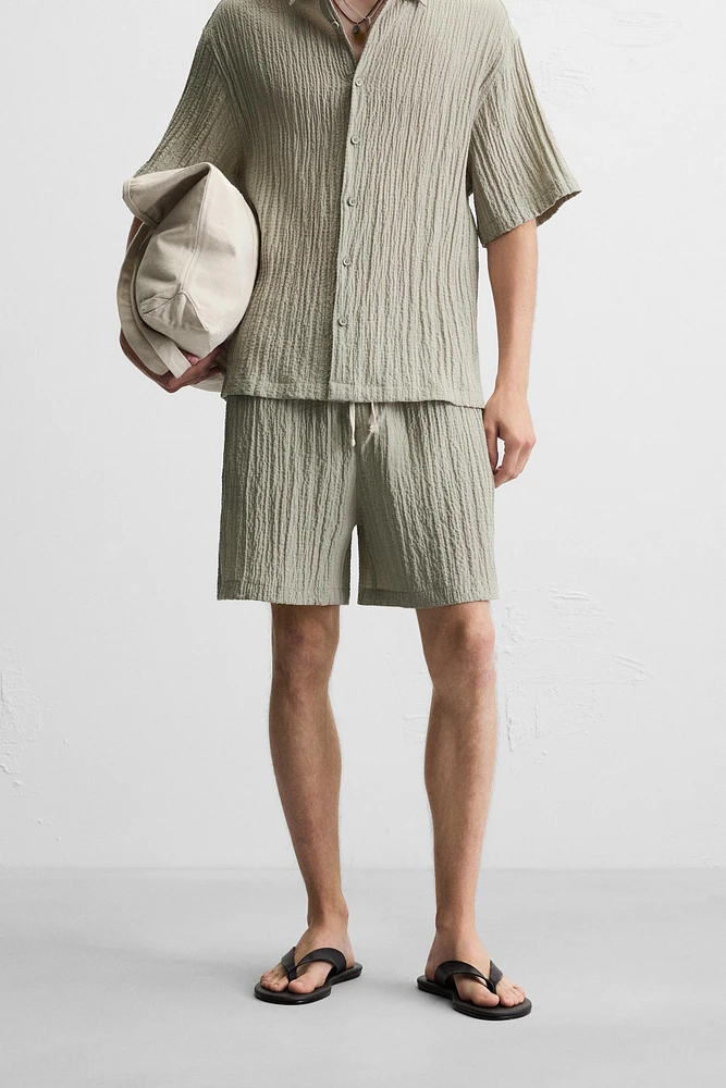WRINKLED EFFECT JACQUARD BERMUDA SHORTS