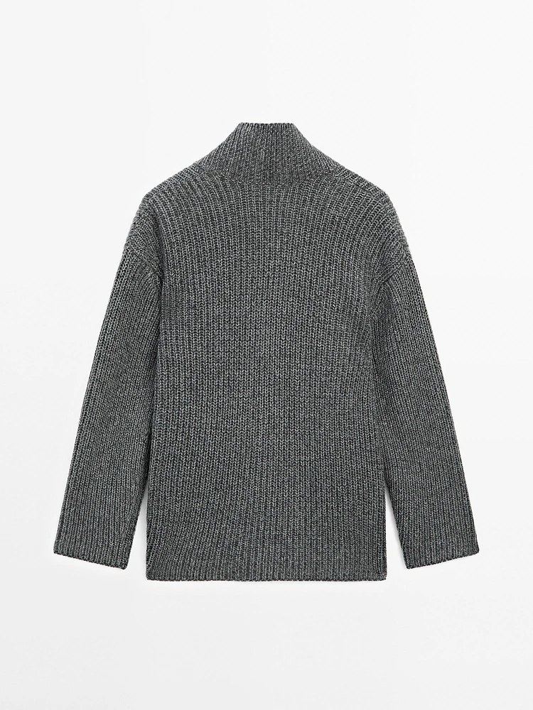 Pull en maille perlée à col effiloché