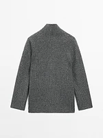 Pull en maille perlée à col effiloché