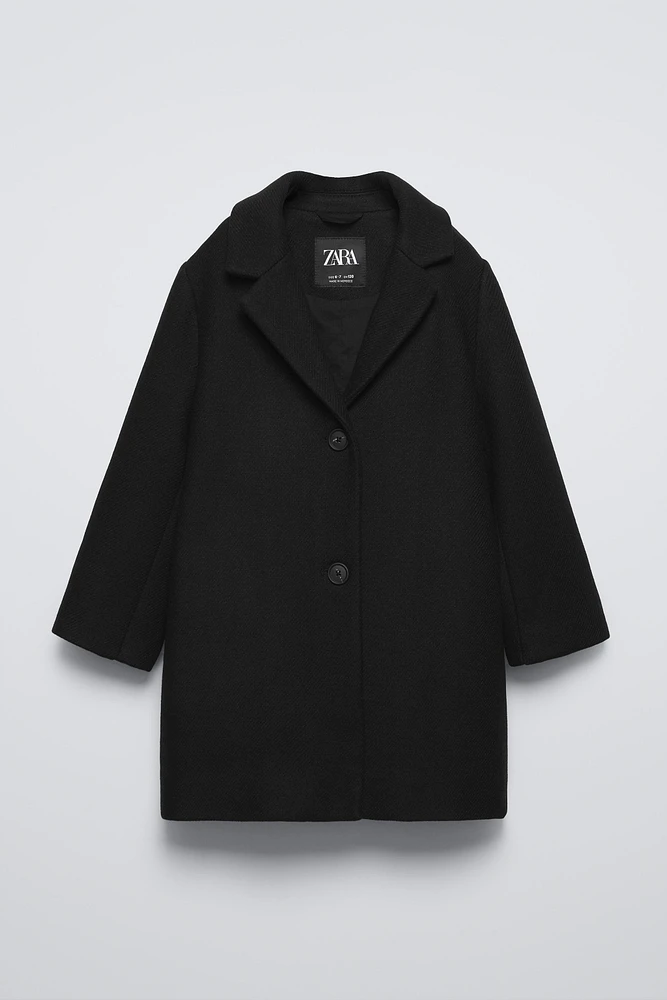 MANTEAU CONTENANT DE LA LAINE