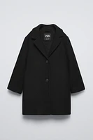 MANTEAU CONTENANT DE LA LAINE