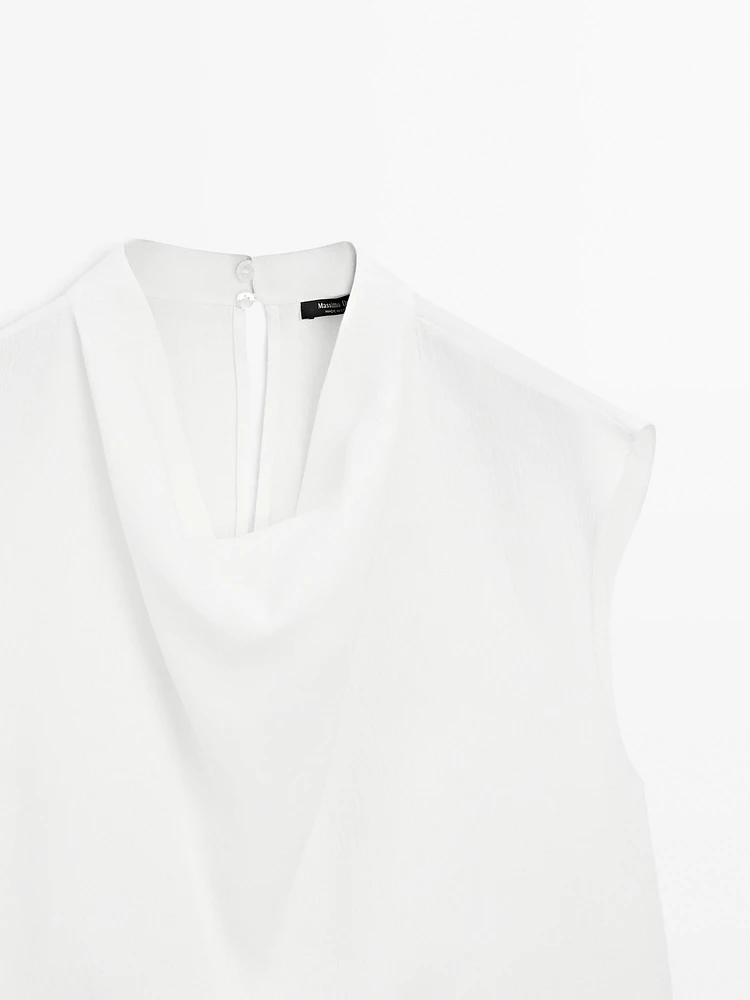 Flowing blouse with draped collar