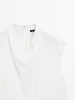 Flowing blouse with draped collar