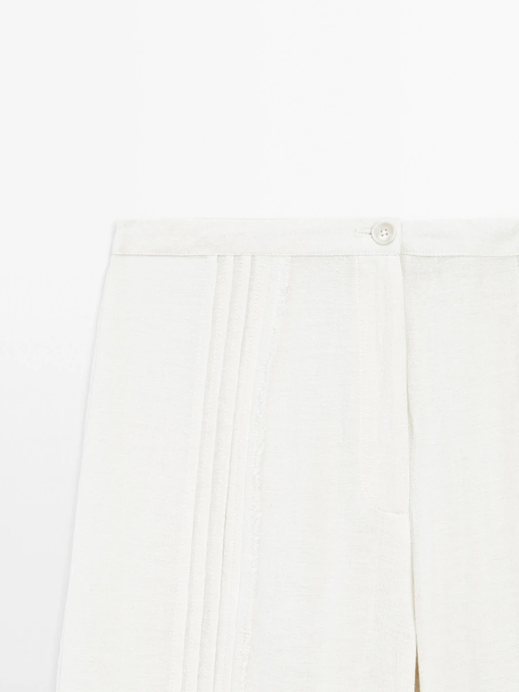 Pantalon avec broderies en coton mélangé