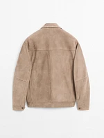 Blouson avec boutons en cuir effet daim