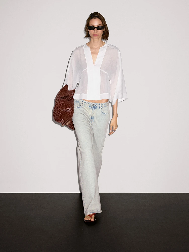 Flowing linen blend blouse with seam details