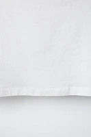 HAUT ASYMÉTRIQUE À ŒILLETS