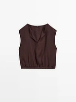 Linen blouse with elasticated hem
