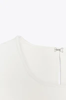 TIE-DETAIL PEPLUM KNIT TOP