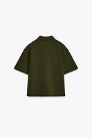 TOP À COL POLO AVEC ZIP