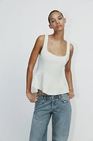STRETCHY PEPLUM TOP