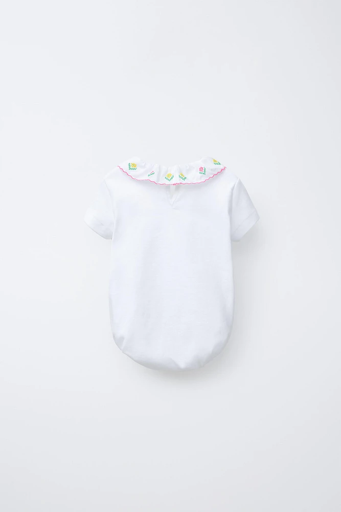 EMBROIDERED NECK BODYSUIT