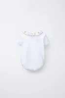EMBROIDERED NECK BODYSUIT