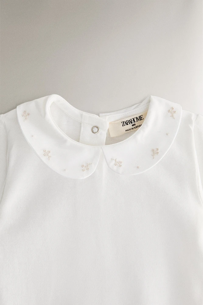 CHILDREN'S BODYSUIT WITH FLORAL EMBROIDERY