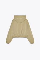 BLOUSON EFFET GOMME AVEC CAPUCHE