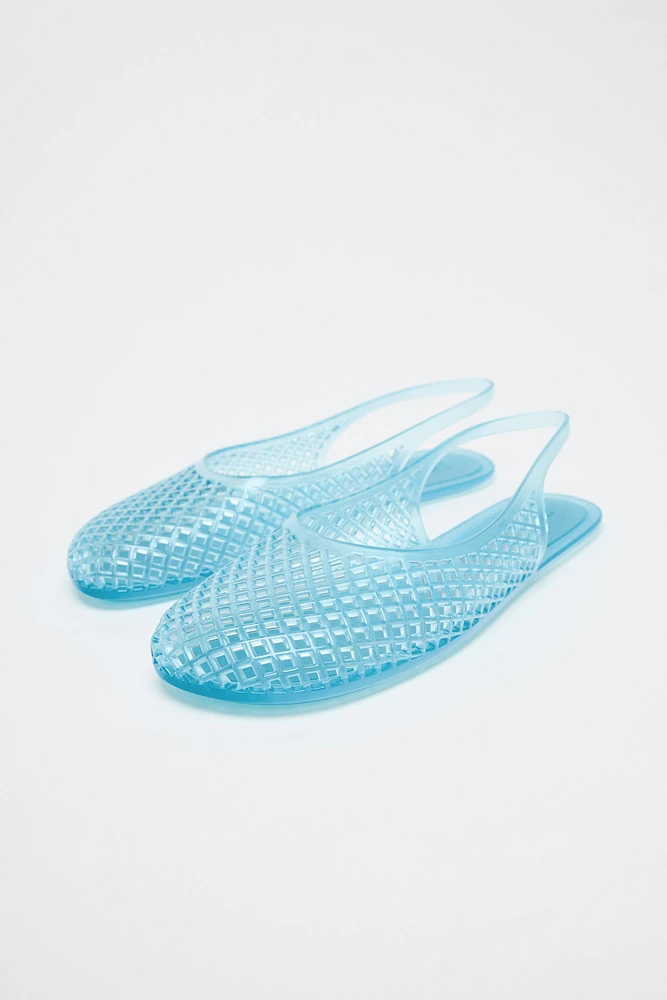 CHAUSSURES OUVERTES À L'ARRIÈRE EFFET GOMME