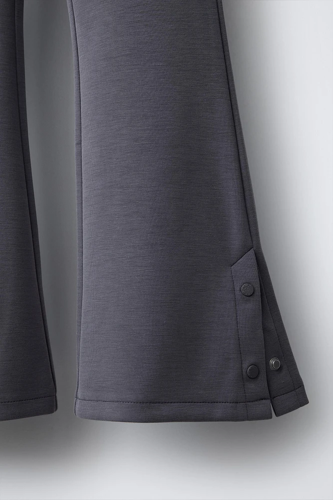BUTTONED FLARED LEGGINGS