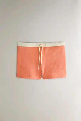 CHILDREN’S CONTRAST-COLORED BEACH SWIMSUIT
