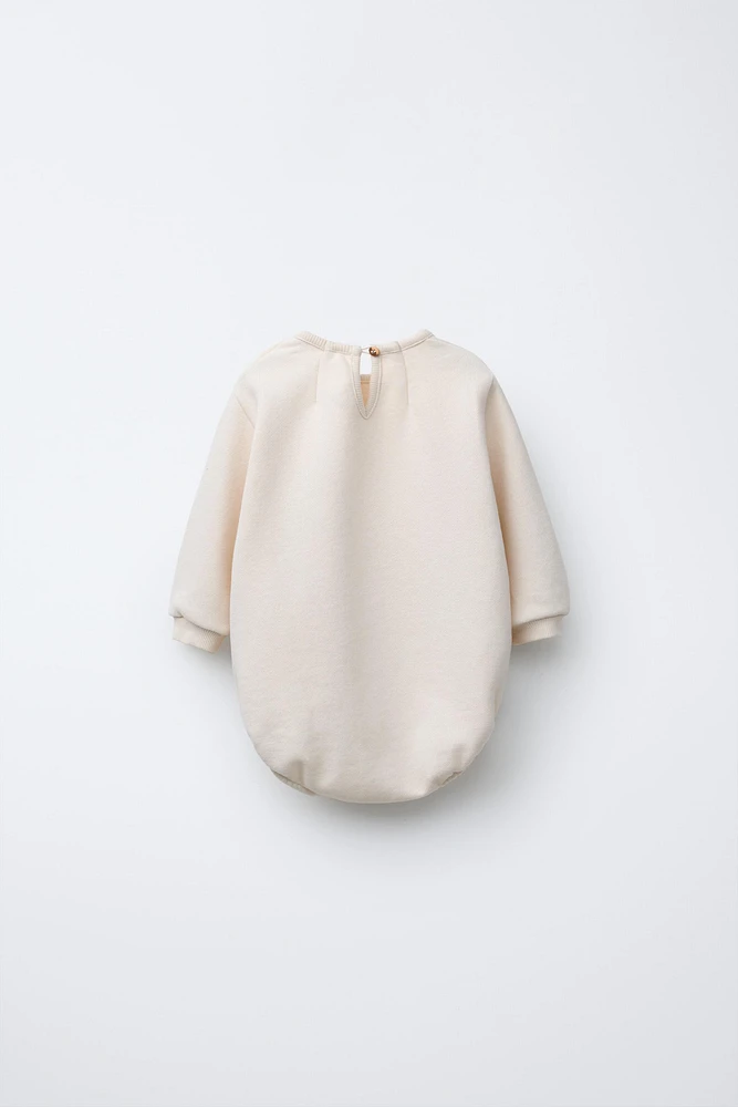 FLOCKED PRINT PLUSH BODYSUIT
